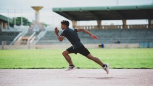 Young boy running on track etruegames new games reviews by etruesports